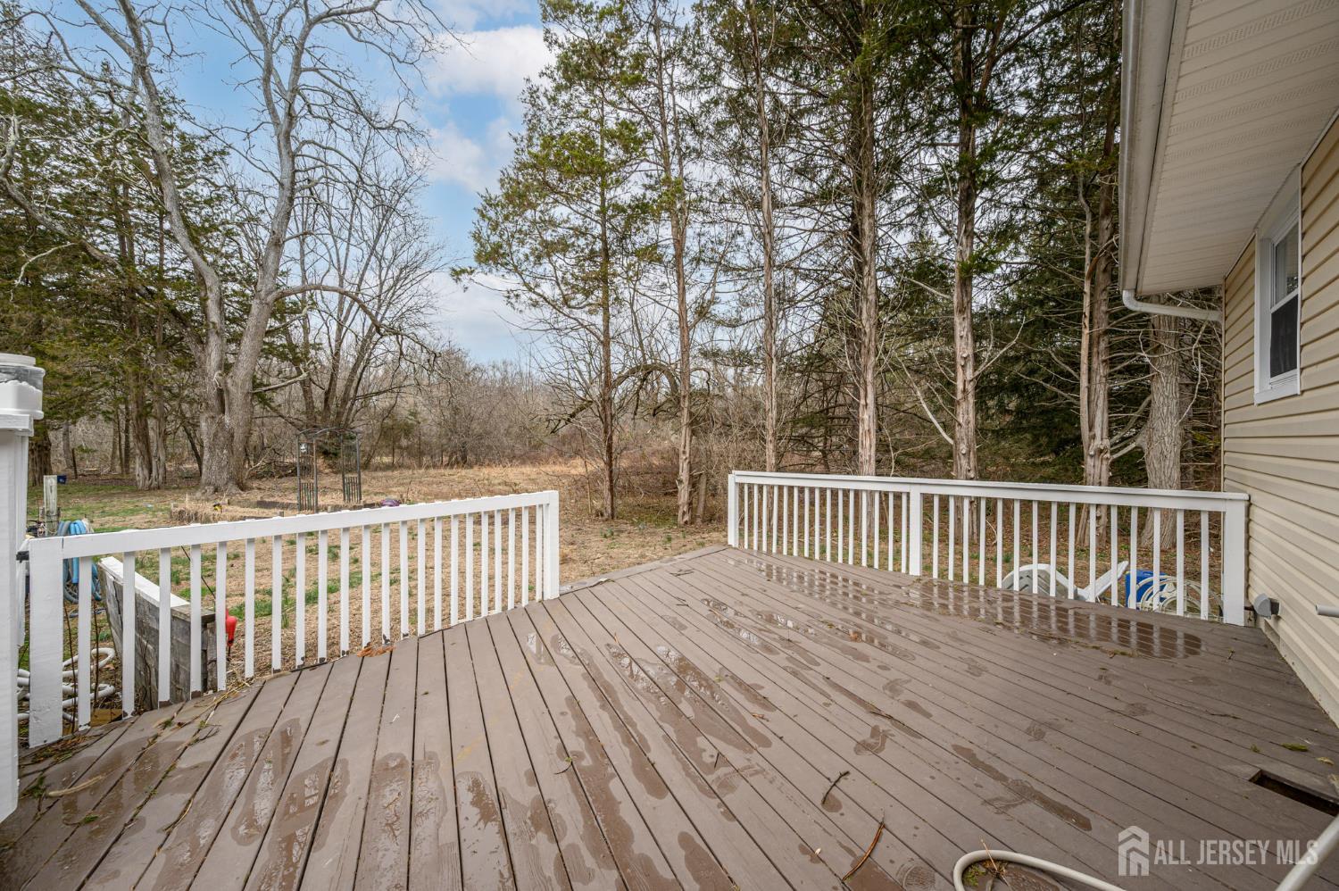 384 Cook Road Jackson, NJ 08527 - Photo 25 of 31 a view of deck with wooden floor and fence
