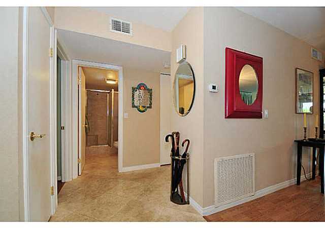 6385 Rancho Mission Road, Unit 3 San Diego, CA 92108 - Photo 5 of 18 Foyer has travertine marble floors that extend into the kitchen and hallway and baths.