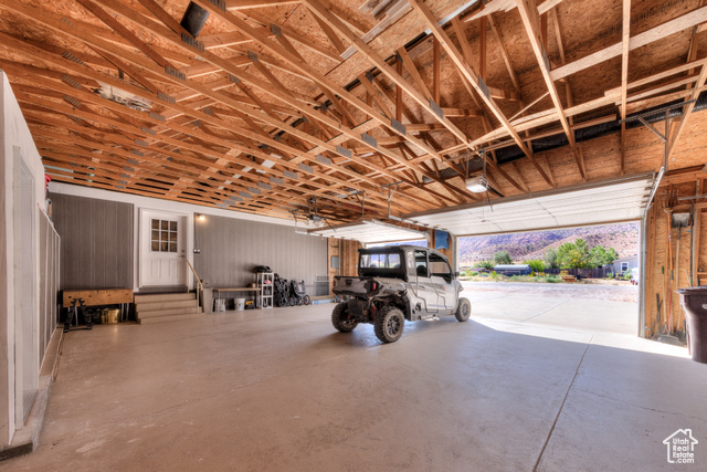 33 Merriam Court Moab, UT 84532 - Photo 47 of 56 Huge 1200 sqft garage (3 car) with tons of storage, shelving, and work bench