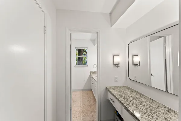 a view of a hallway with staircase