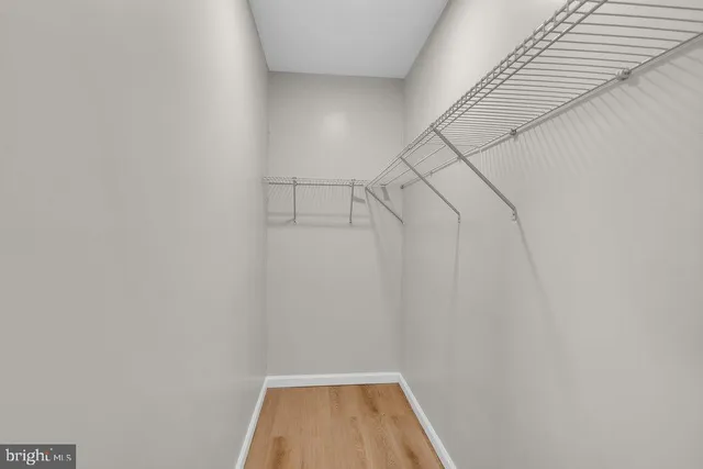 a view of a room with racks on the wall