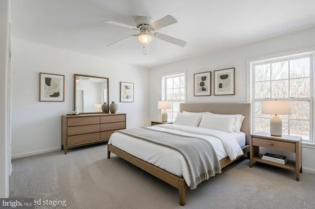 a bathroom with a sink a mirror and a toilet