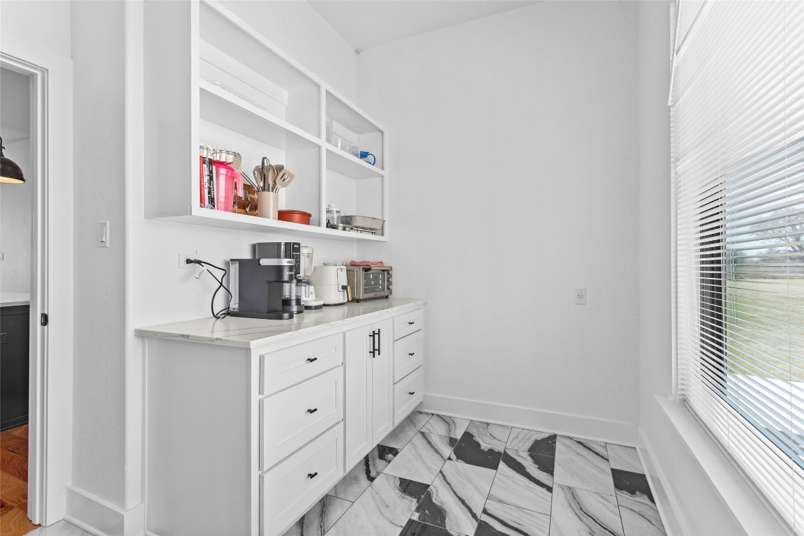 4346 Highway 21 Paige, TX 78659 - Photo 18 of 40 a room with cabinets and window