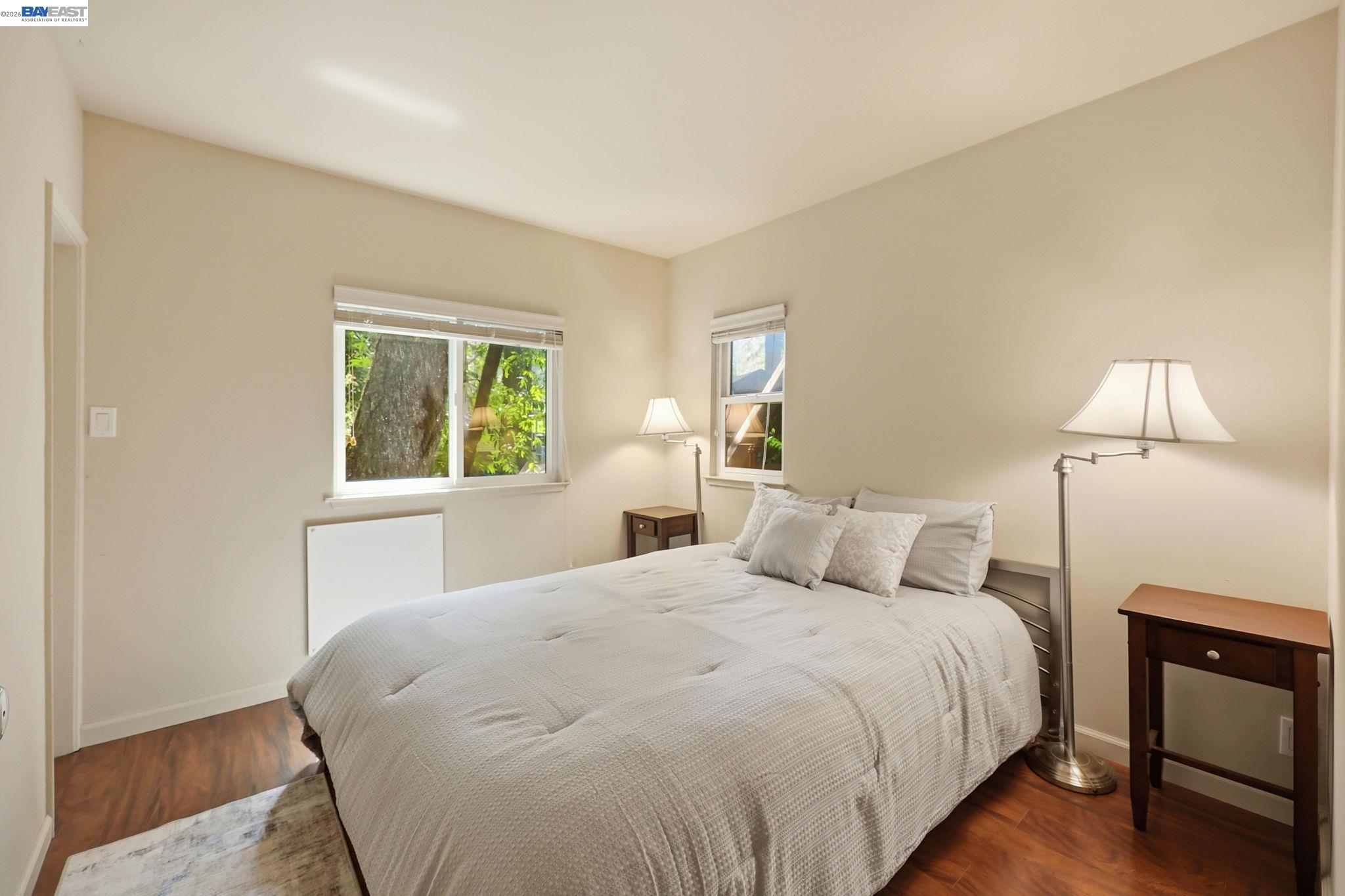 11700 Oak Road Forestville, CA 95436 - Photo 11 of 20 a bedroom with a bed and a window