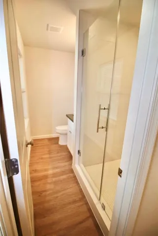 a bathroom with a sink and a shower