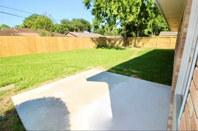 a view of yard from a tub