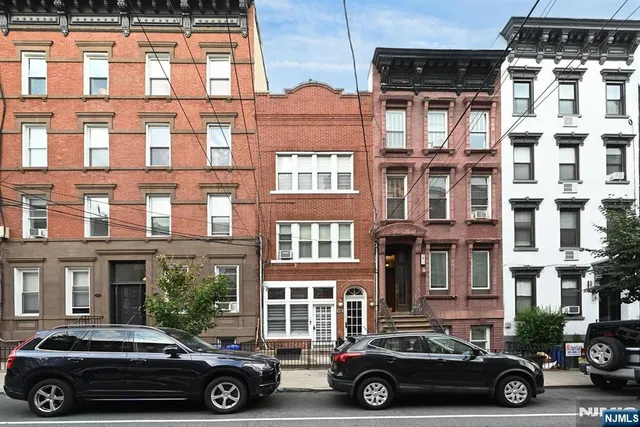 a car parked in front of a building