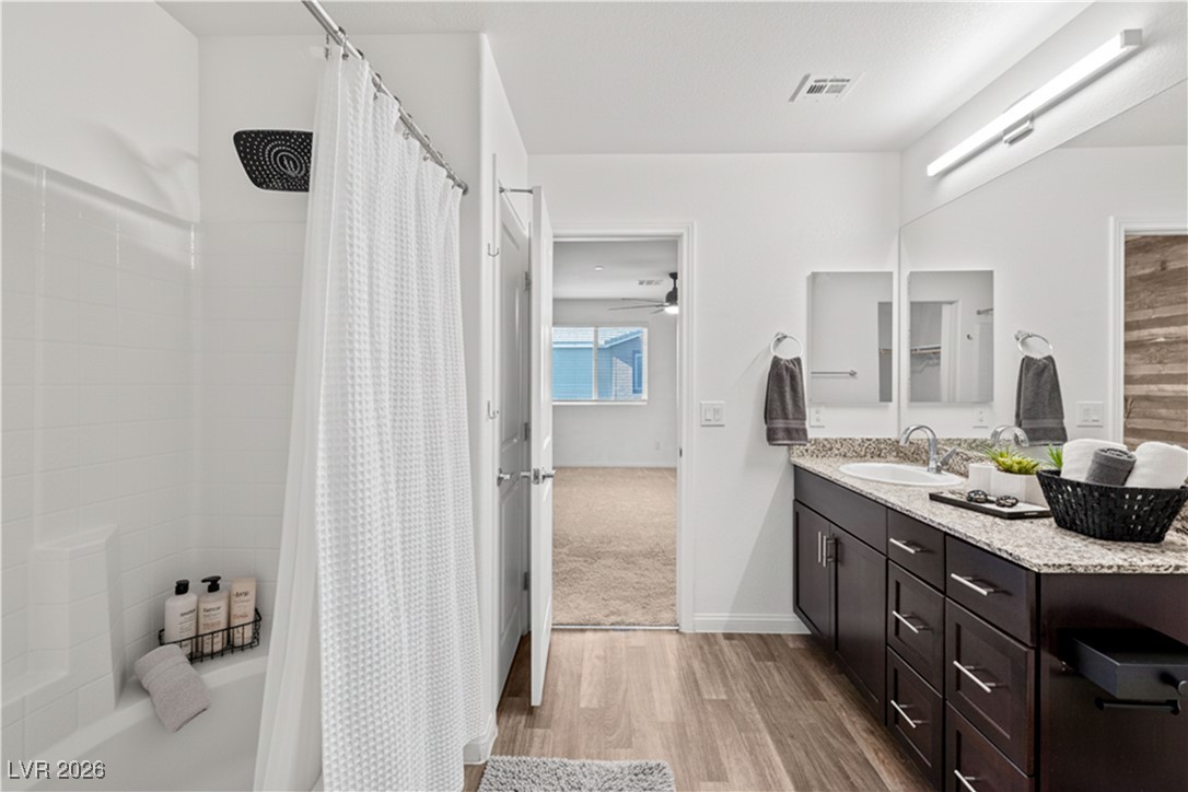 12280 Golden Wreath Road, Unit 3 Las Vegas, NV 89183 - Photo 20 of 57 Primary bathroom virtually staged