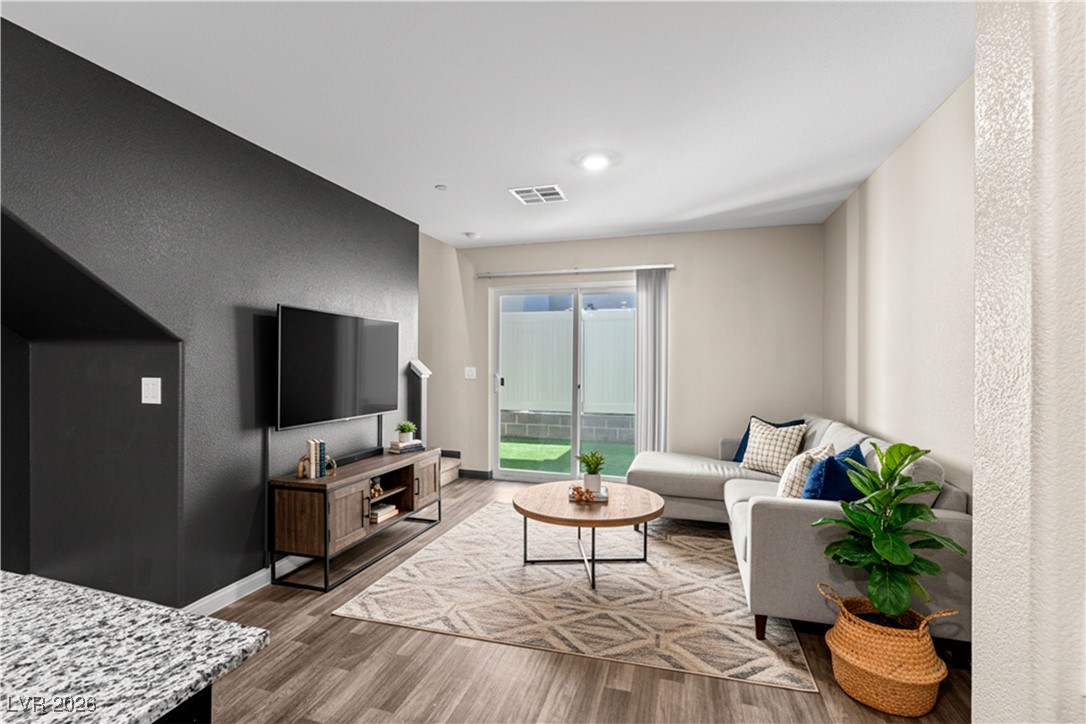 12280 Golden Wreath Road, Unit 3 Las Vegas, NV 89183 - Photo 2 of 57 Living room virtually staged
