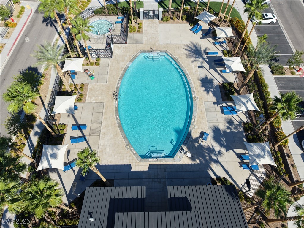 12280 Golden Wreath Road, Unit 3 Las Vegas, NV 89183 - Photo 42 of 57 Community pool with a patio area