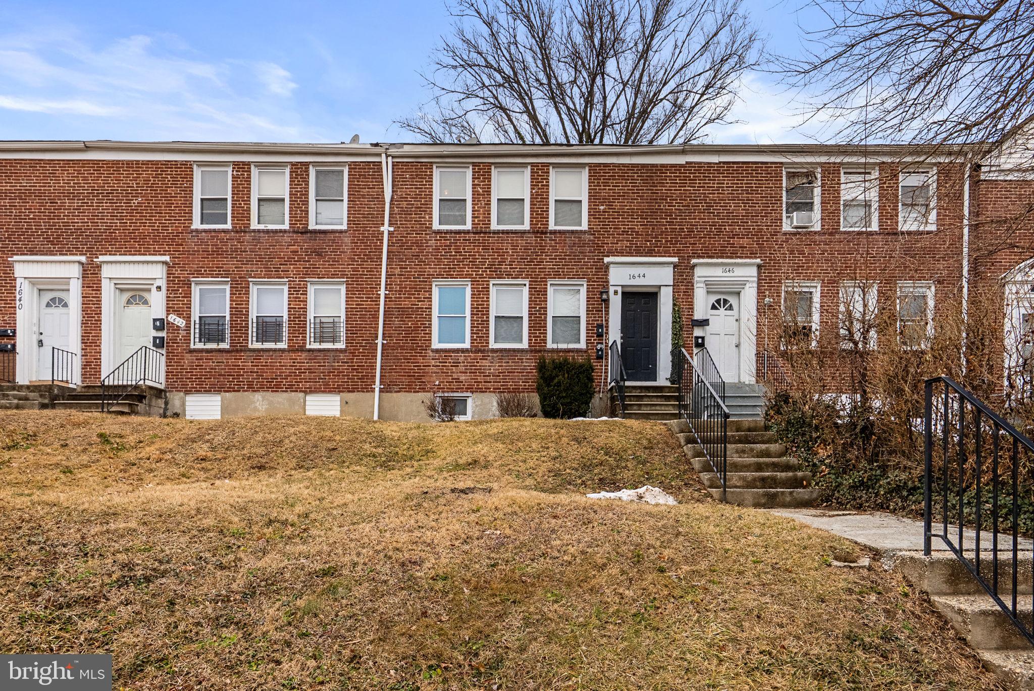 1644 East Cold Spring Lane Baltimore, MD 21218 - Photo 1 of 1 a front view of a house