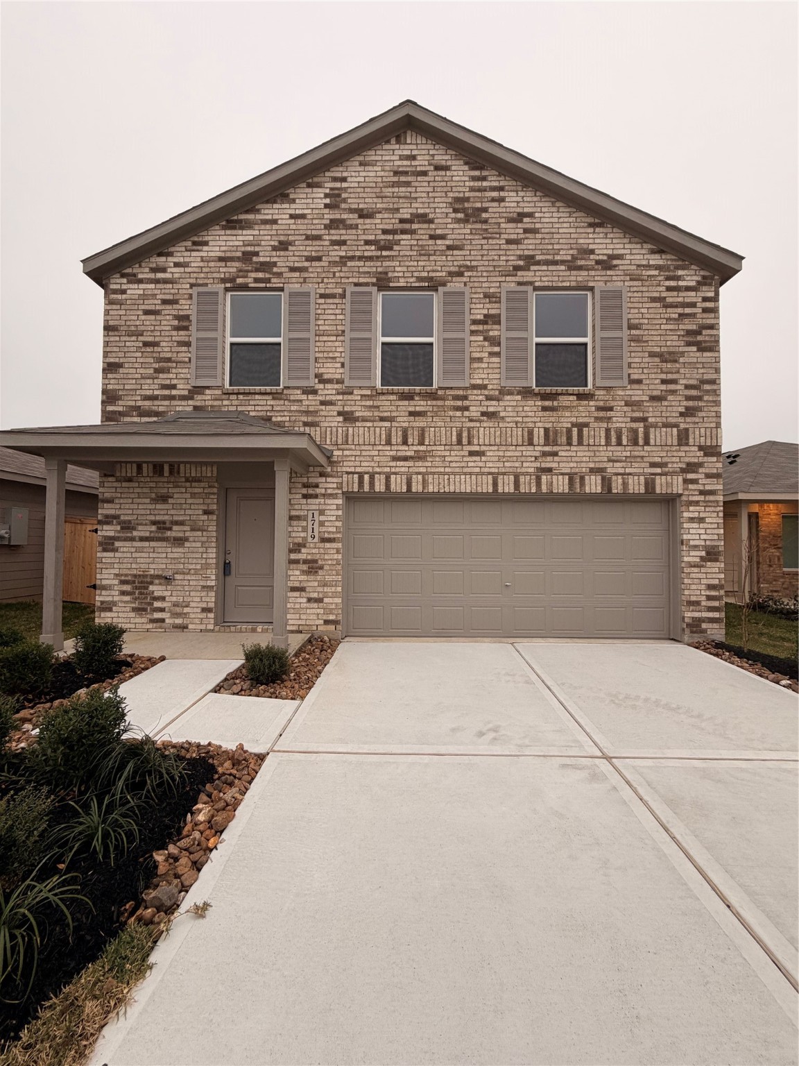 a front view of house with yard