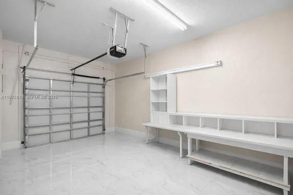 a view of a room with racks on the wall