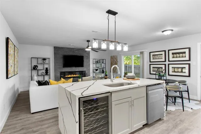 a view of a kitchen area kitchen island dining table and chairs
