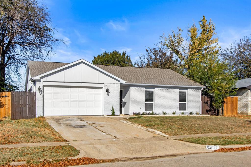 5405 Ramsey Drive The Colony, TX 75056 - Photo 2 of 32 a view of garage yard and tree