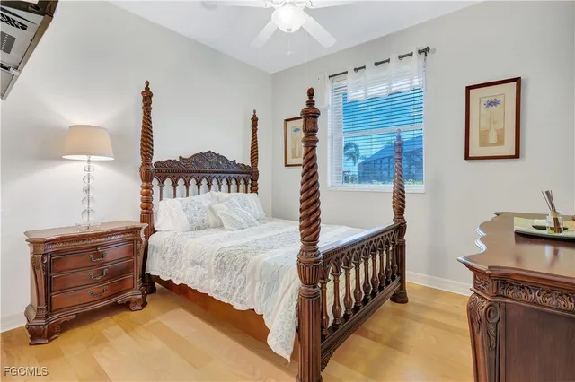 a bedroom with furniture and a window