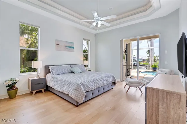 a view of a livingroom with workspace and a window