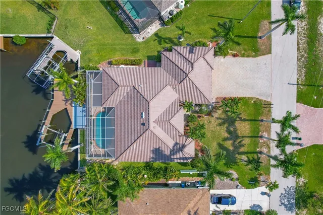 a view of house with backyard outdoor seating and city view