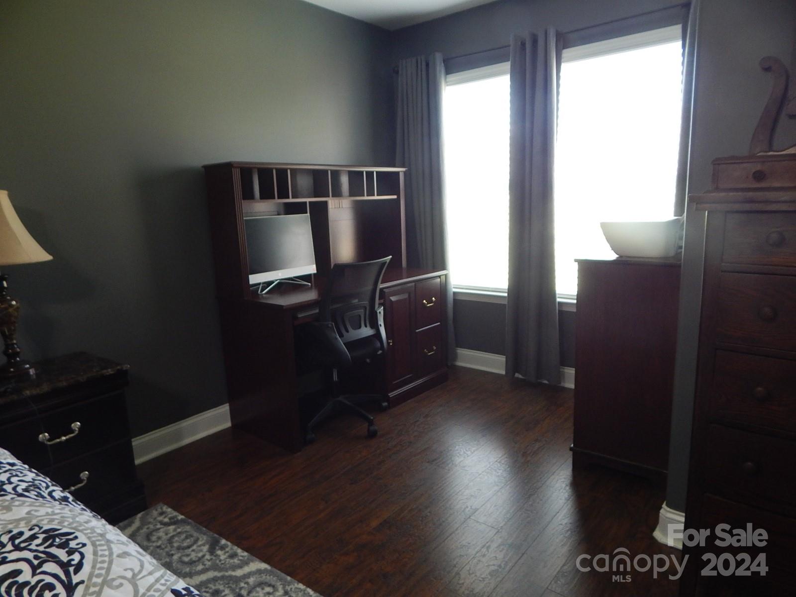 300 Ashmont Drive Kannapolis, NC 28081 - Photo 15 of 42 a kitchen with cabinets and wooden floor