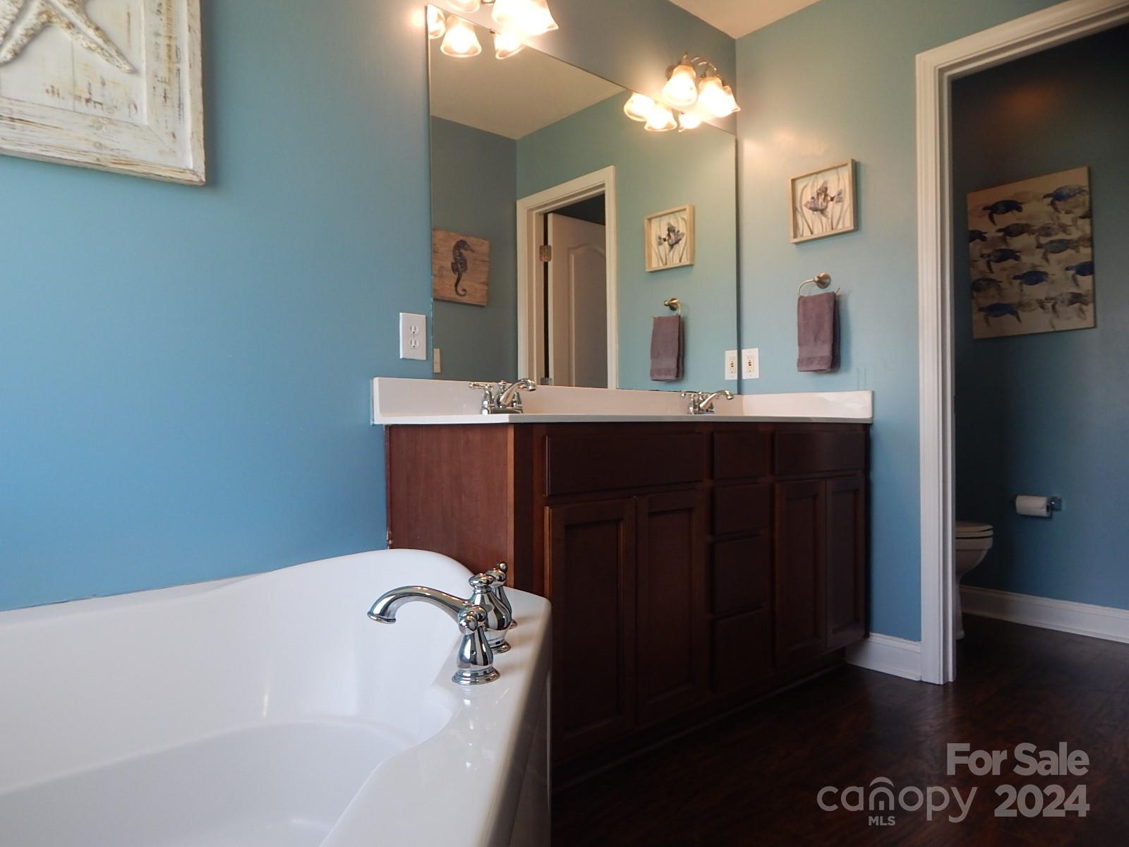 300 Ashmont Drive Kannapolis, NC 28081 - Photo 18 of 42 a bathroom with a bathtub and a sink