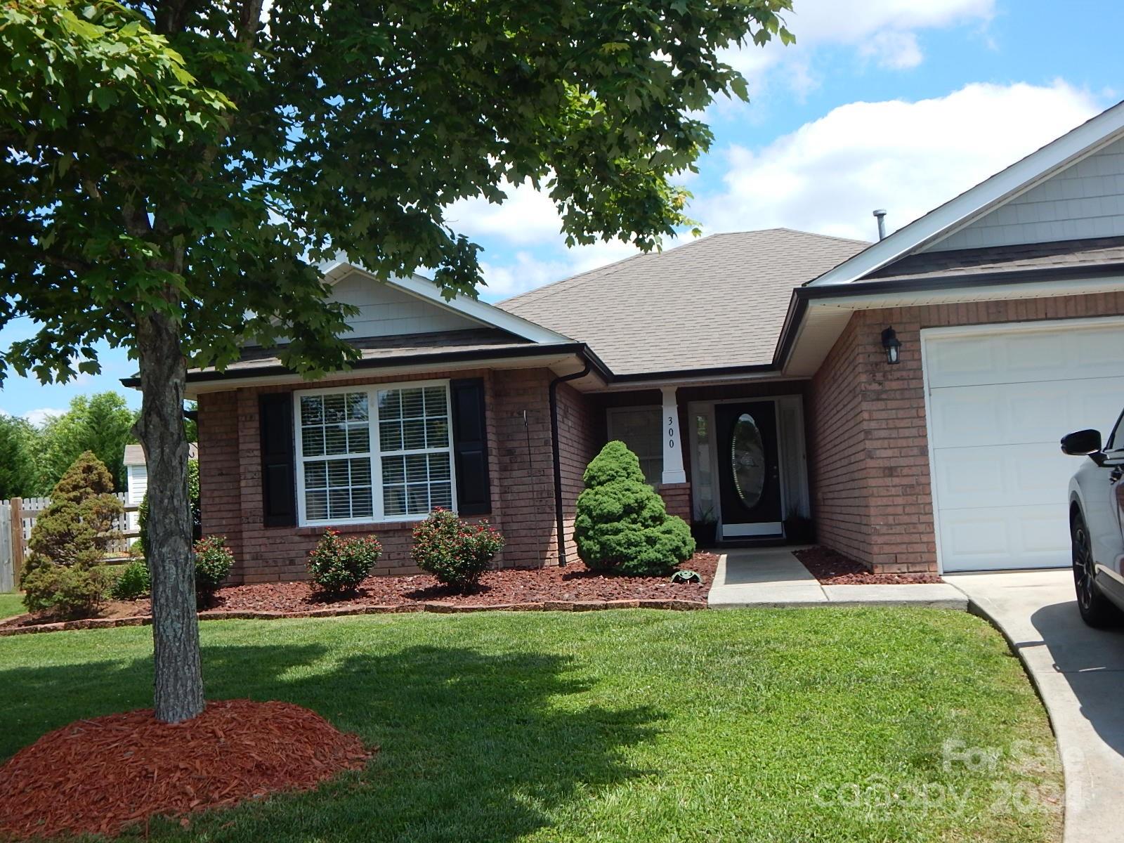 300 Ashmont Drive Kannapolis, NC 28081 - Photo 2 of 42 a view of a house with backyard and garden
