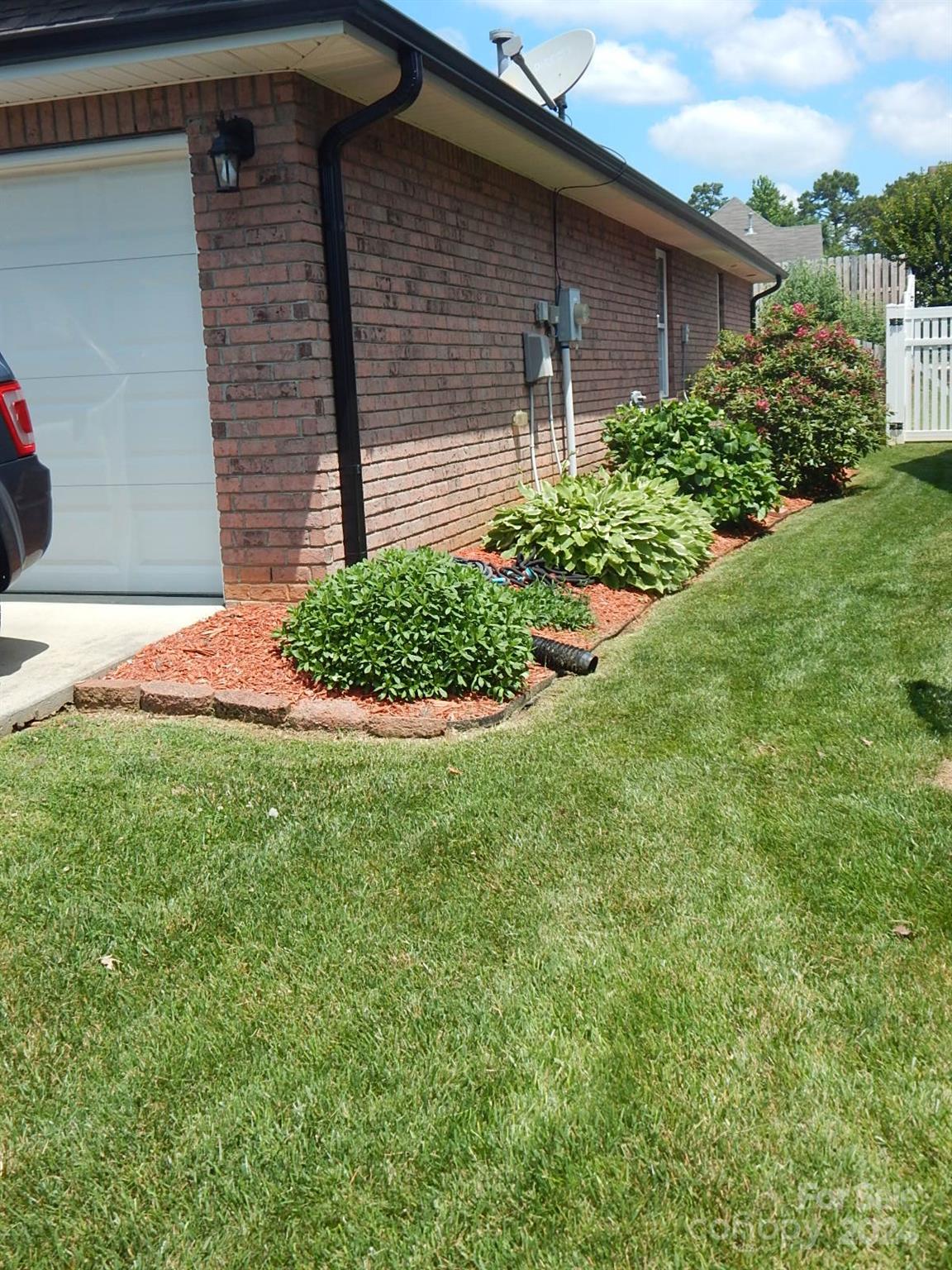 300 Ashmont Drive Kannapolis, NC 28081 - Photo 22 of 42 a front view of a house with garden
