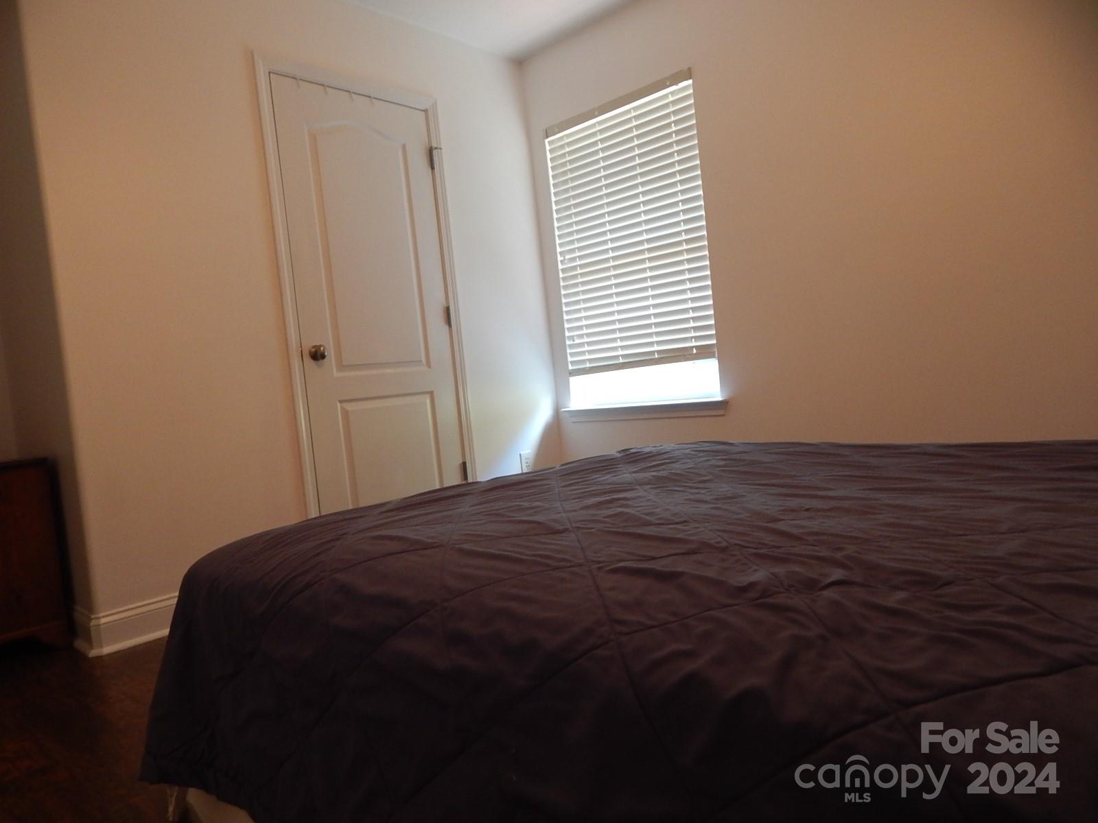 300 Ashmont Drive Kannapolis, NC 28081 - Photo 24 of 42 a bedroom with a bed and a window