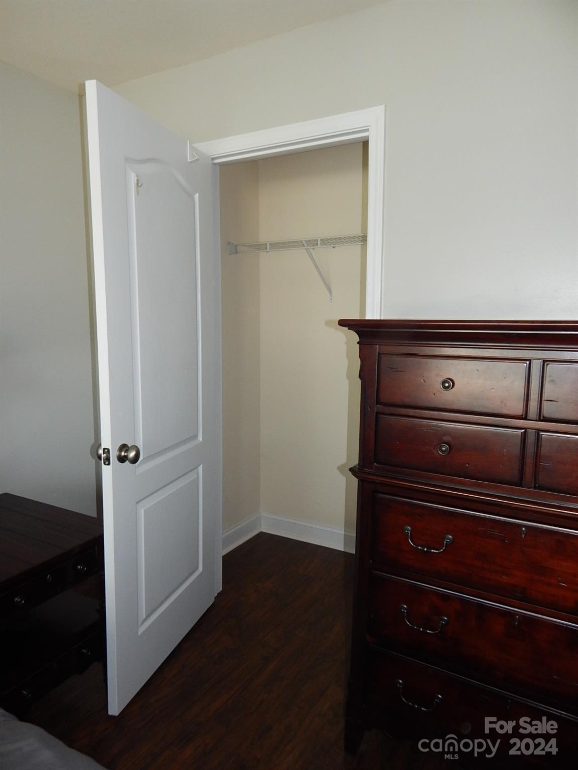 300 Ashmont Drive Kannapolis, NC 28081 - Photo 26 of 42 a view of a closet area with hardwood floor