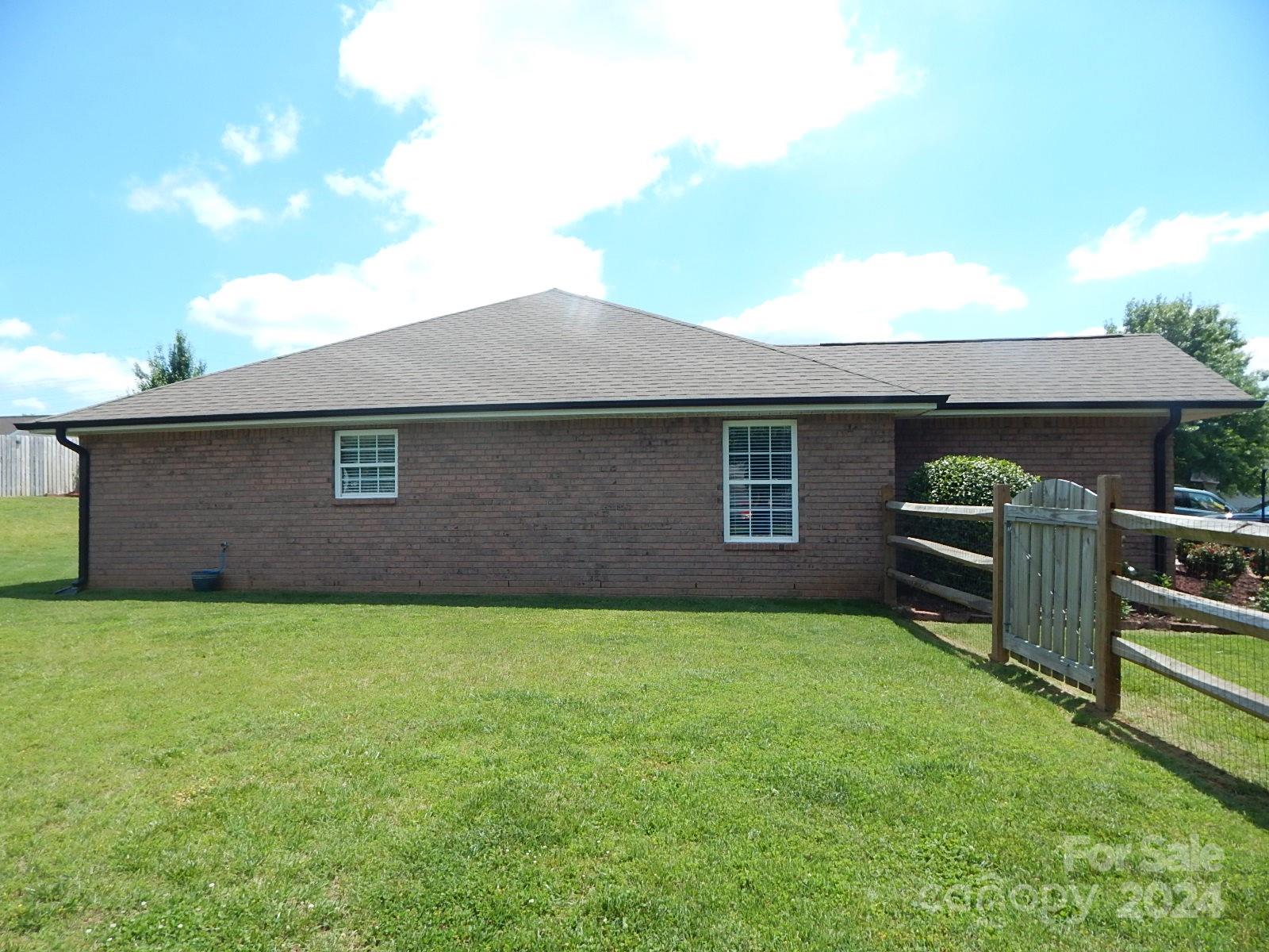 300 Ashmont Drive Kannapolis, NC 28081 - Photo 34 of 42 a front view of a house with a garden
