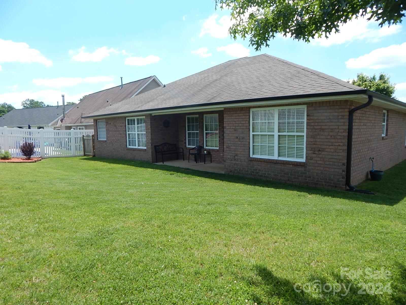 300 Ashmont Drive Kannapolis, NC 28081 - Photo 35 of 42 a view of a house with a garden