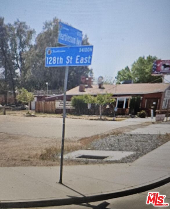 0 East Vac/vic Avenue, Unit W8/128 Pearblossom, CA 93553 - Photo 8 of 11 a front view of a house with street