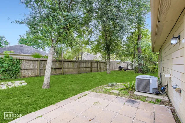 a backyard of a house with seating space