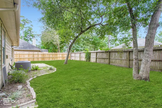 a view of a backyard with a garden