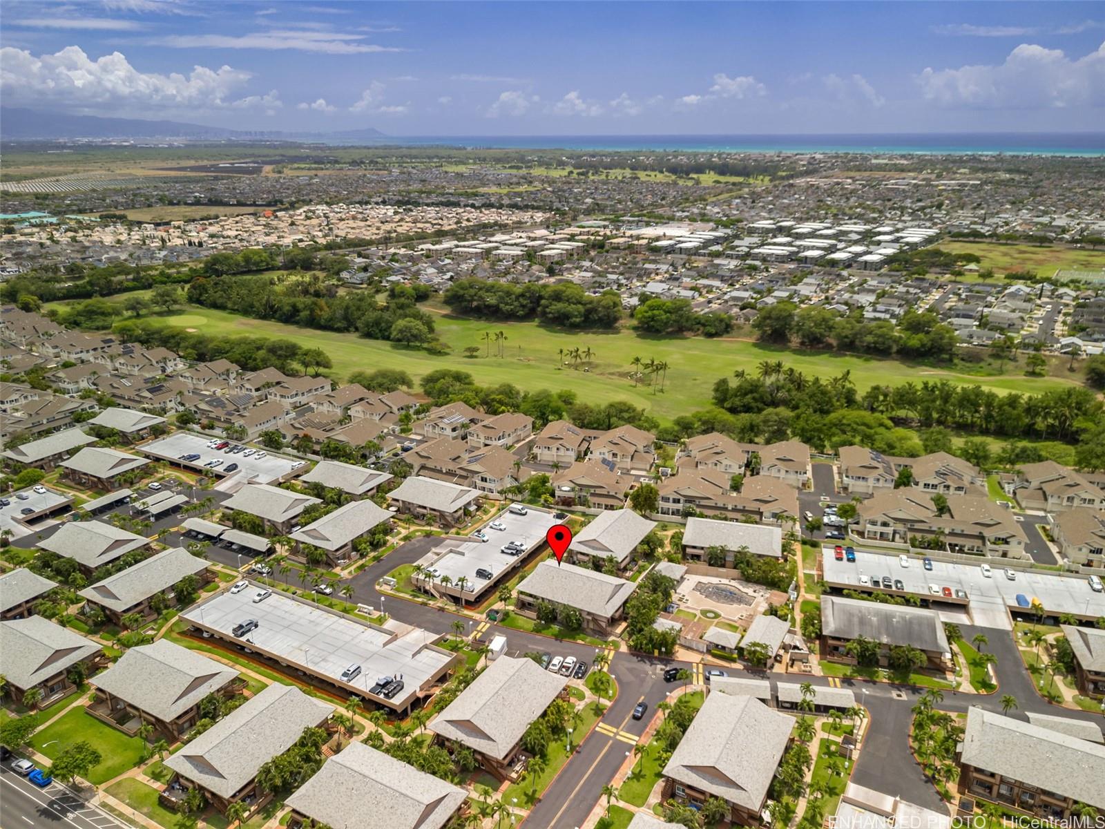91-1119 Mikohu Street, Unit 28S Ewa Beach, HI 96706 - Photo 4 of 19 an aerial view of residential houses with outdoor space