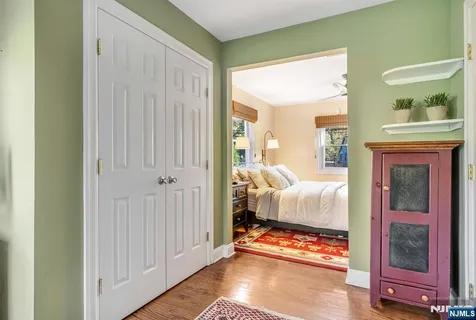 a view of a livingroom with furniture and front door