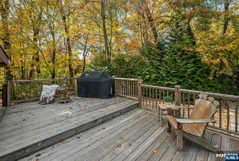 a house view with a sitting space and garden