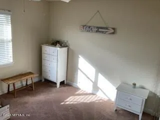 a bathroom with a sink toilet and mirror