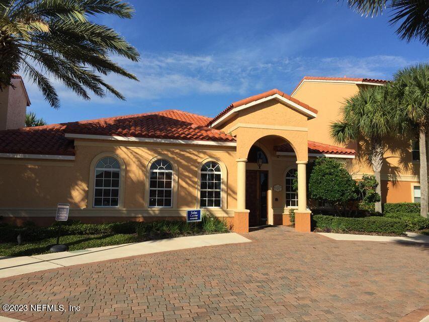 201 25th Avenue South, Unit N32 Jacksonville Beach, FL 32250 - Photo 25 of 38 a view of a building with a yard