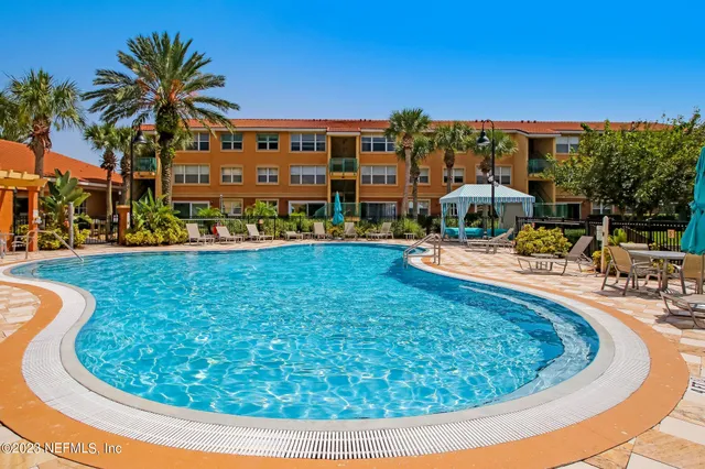 a dining room with furniture and outdoor view