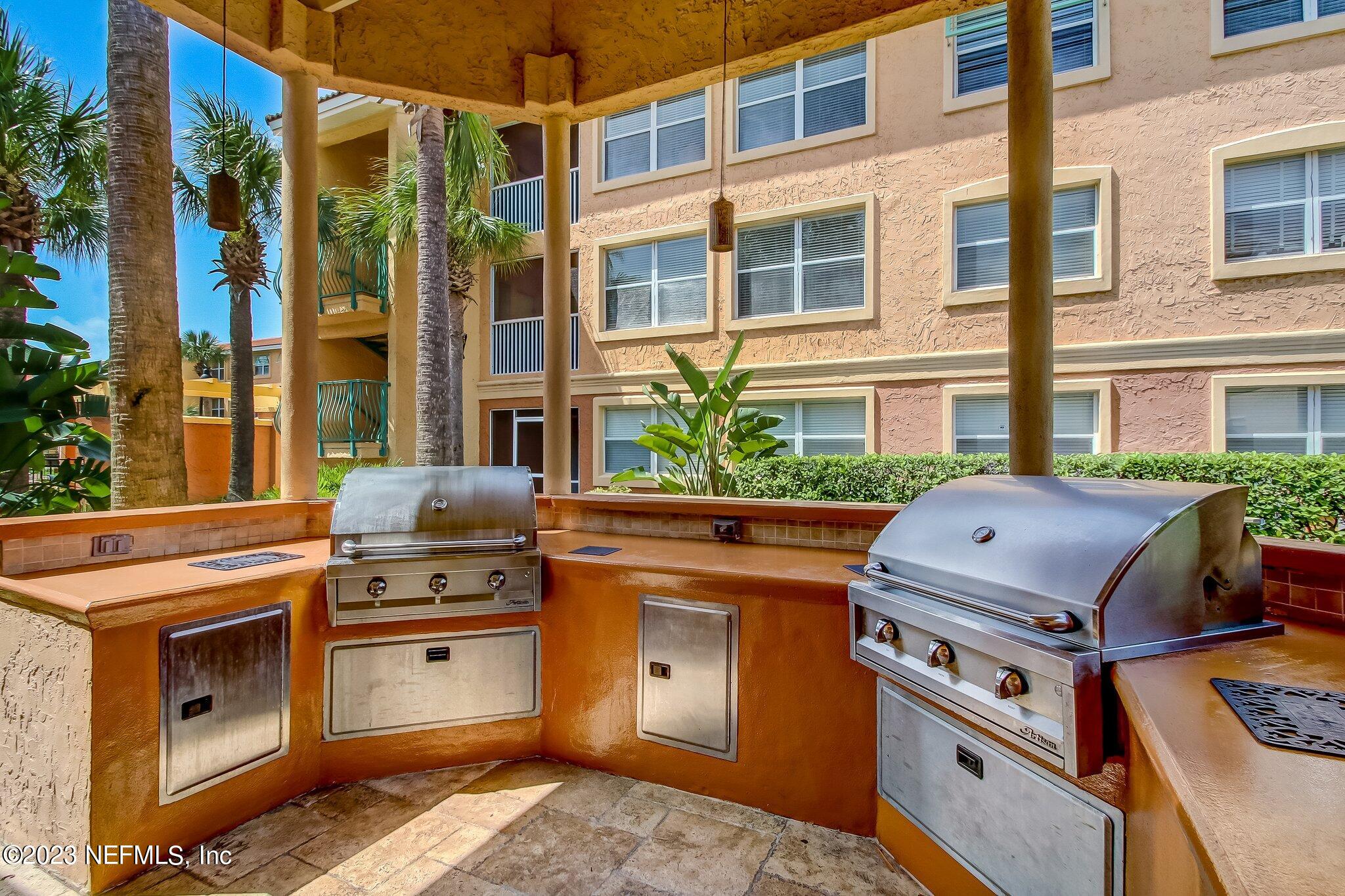 201 25th Avenue South, Unit N32 Jacksonville Beach, FL 32250 - Photo 37 of 38 a view of a kitchen with a stove top oven