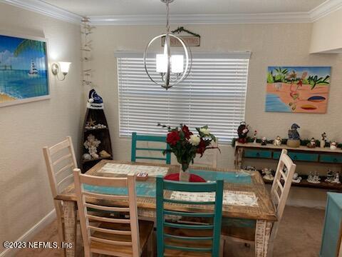 201 25th Avenue South, Unit N32 Jacksonville Beach, FL 32250 - Photo 8 of 38 a view of a dining room with furniture and wooden floor