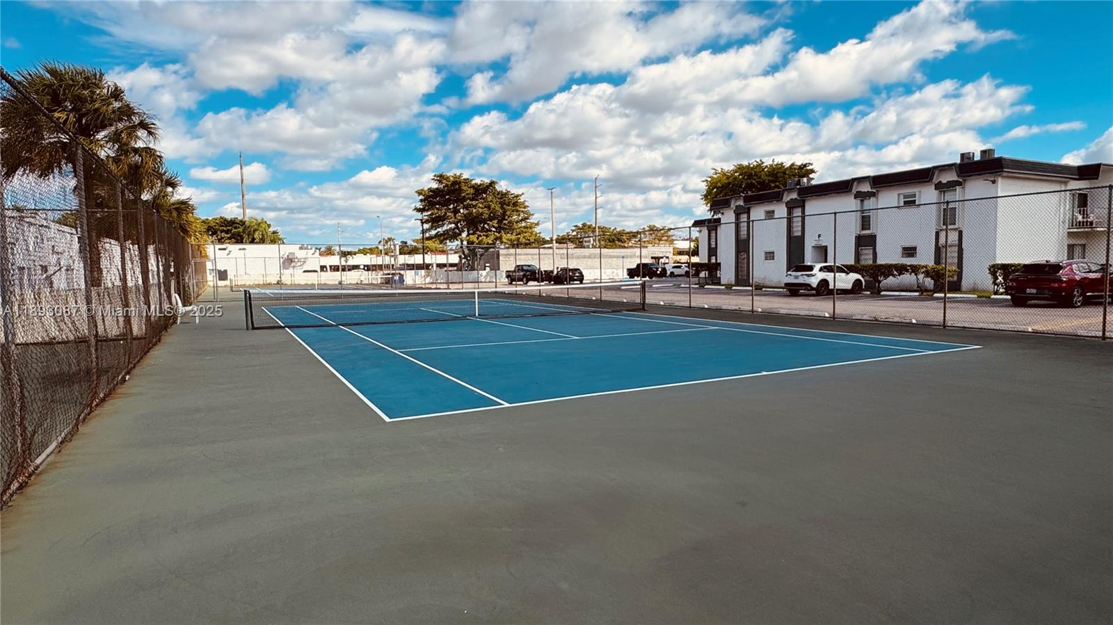 7226 Southwest 94th Place, Unit F7 Miami, FL 33173 - Photo 20 of 23 a view of a street with houses
