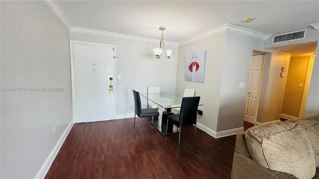a view of a livingroom with furniture and wooden floor
