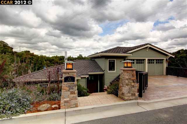 45 Oak Road Orinda, CA 94563 - Photo 1 of 1 a front view of a house with a yard