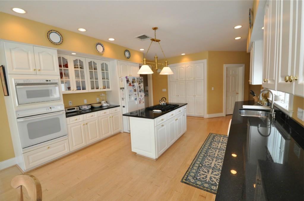 20 Muirfield Road Cumberland Center, ME 04021 - Photo 5 of 16 The kitchen has radiant heat floors,...
