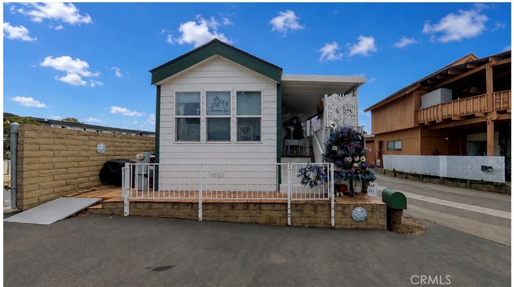 43 Riversea Road Seal Beach, CA 90740 - Photo 2 of 7 a view of a house with a barbeque