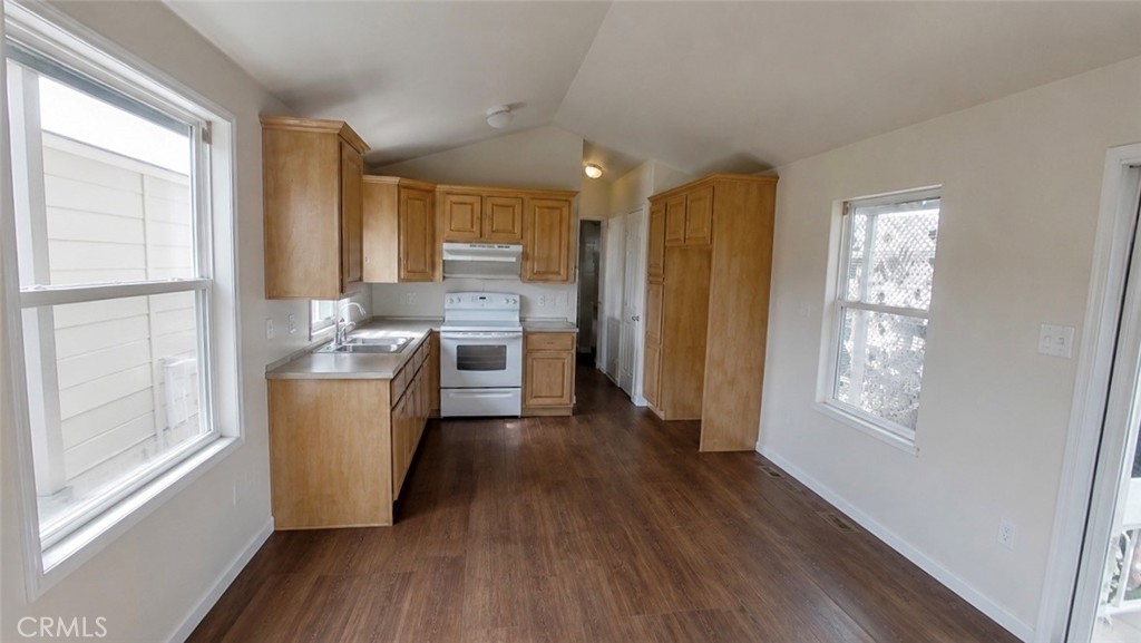 43 Riversea Road Seal Beach, CA 90740 - Photo 3 of 7 a room with wooden floor and windows