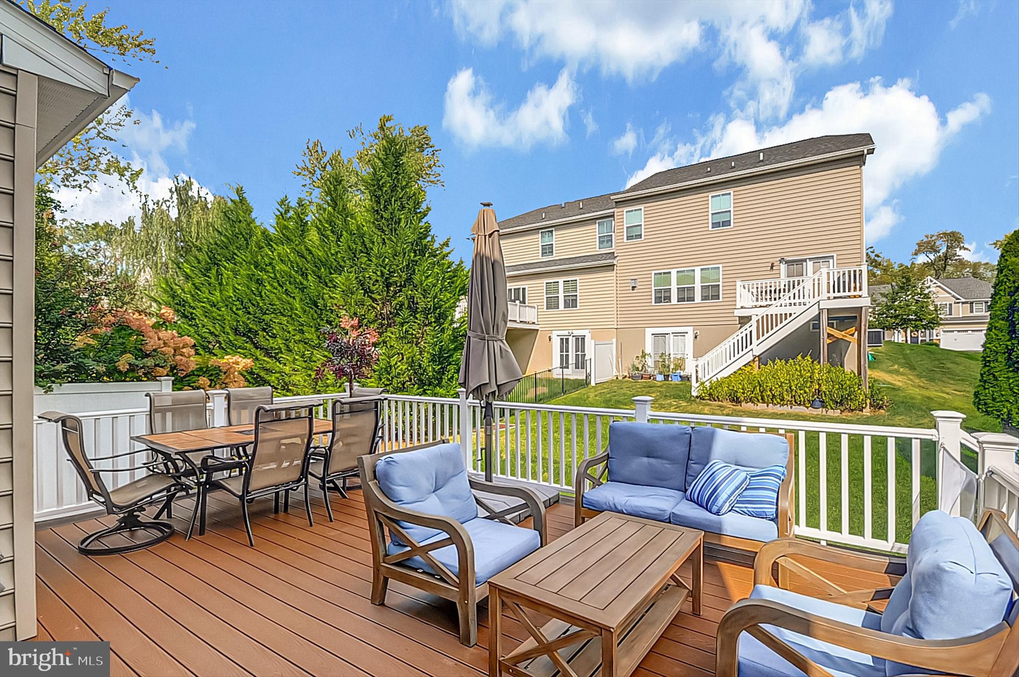 2405 Cindy Lane Warrington, PA 18976 - Photo 15 of 44 a balcony with wooden floor and outdoor seating