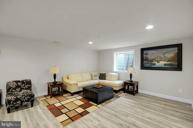 a living room with furniture and a couch