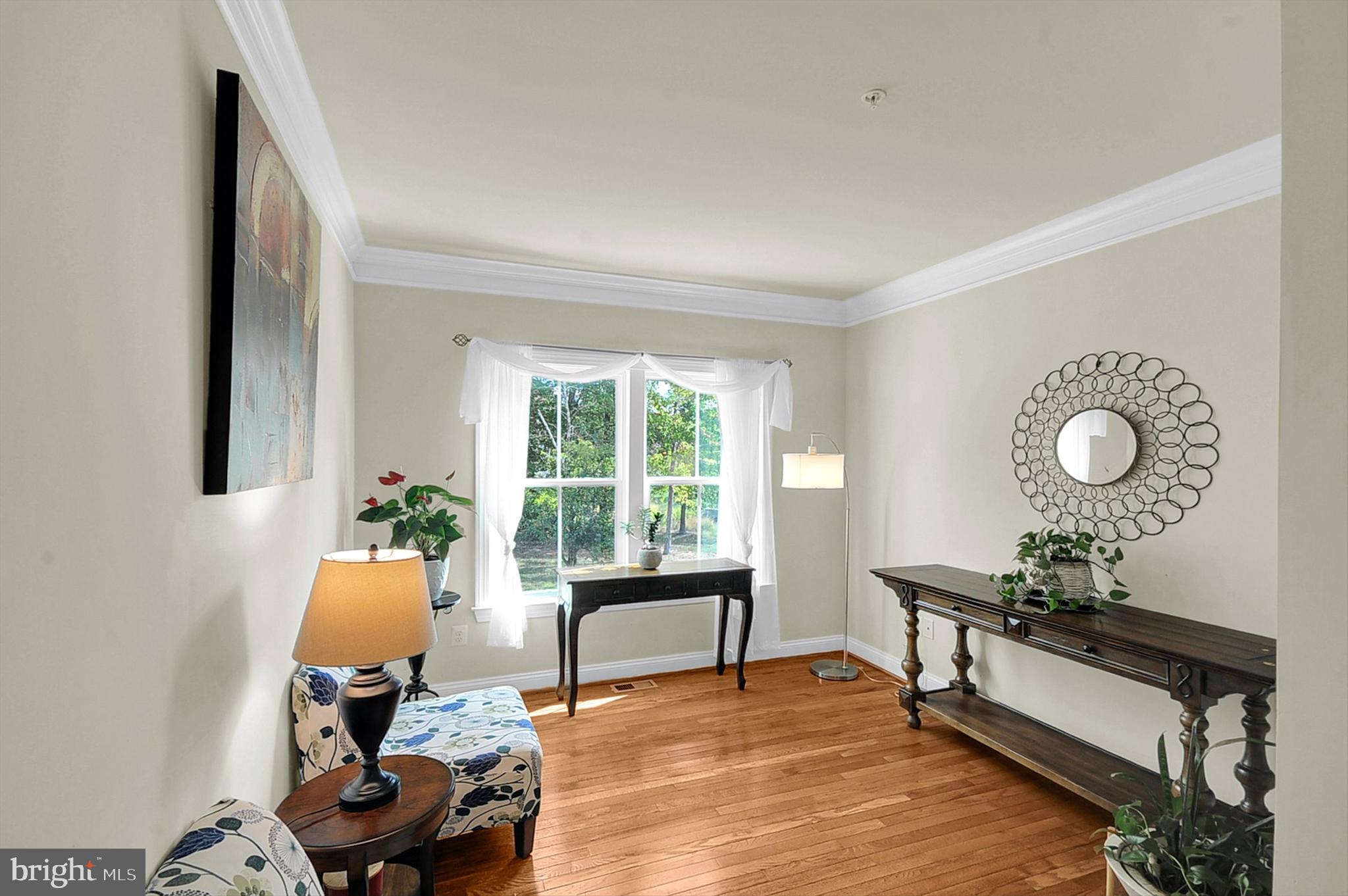 2405 Cindy Lane Warrington, PA 18976 - Photo 9 of 44 a living room with furniture and a wooden floor
